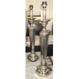 TABLE LAMPS, a pair, chromed metal with reeded column, 74cm H. (2)