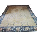 AGRA CARPET, 511cm x 397cm, palmettes and vines on a canary field, within a corresponding jade