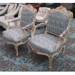 OPEN ARMCHAIRS, a pair, Louis XV style in floral fabric with gold effect highlights cream painted