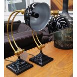 TABLE LAMPS, a pair, black enamelled metal and brass with adjustable crescent arms, 15cm x 42cm max