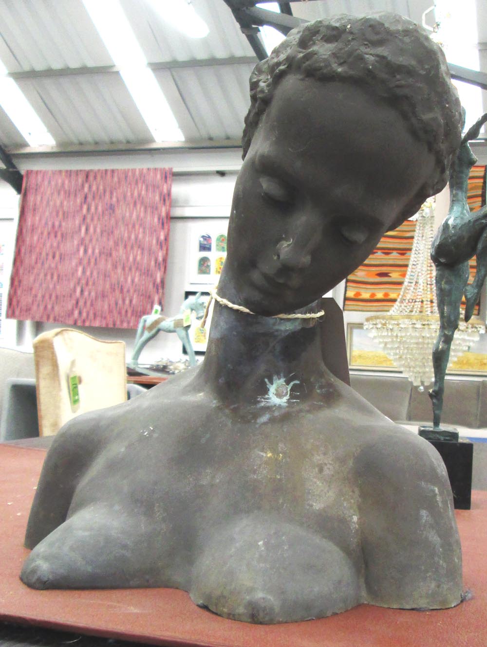 BRONZE BUST, of a woman, 42cm H. (with faults)