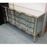 MIRRORED CHEST, with six drawers below on square supports, 147cm x 36cm x 73cm H.