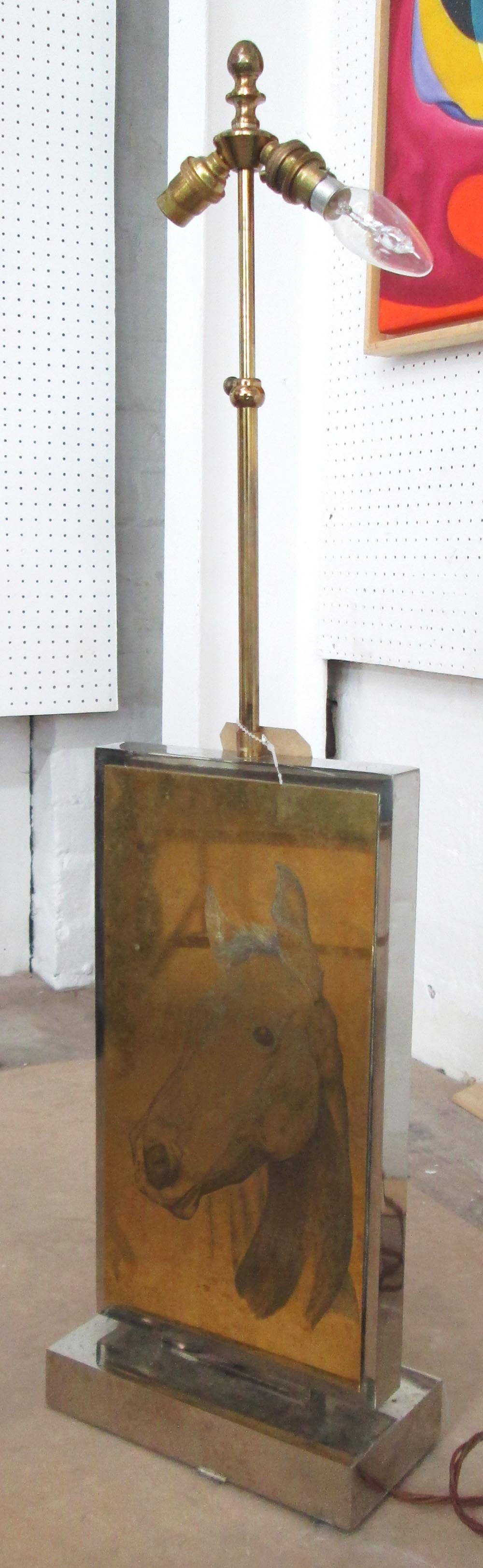 TABLE LAMP, in chromed metal with bronze plaque and etching of horses head, 87cm H.