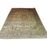 VERY FINE KASHAN CARPET, 386cm x 290cm, central medallion on an ivory field with palmettes and