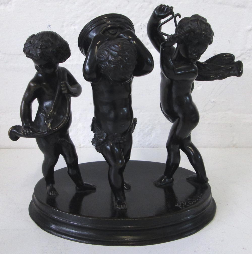 BRONZE MUSICAL PUTTI FIGURE GROUP AFTER CLODION, three figures, on an oval base, 20cm H.