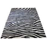 FINE BENARES ZEBRA PRINT CARPET, 304cm x 241cm, all over zebra print design.