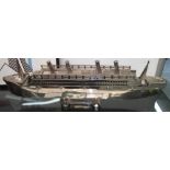 METAL MODEL OF THE TITANIC, on metal stand, 87cm L.