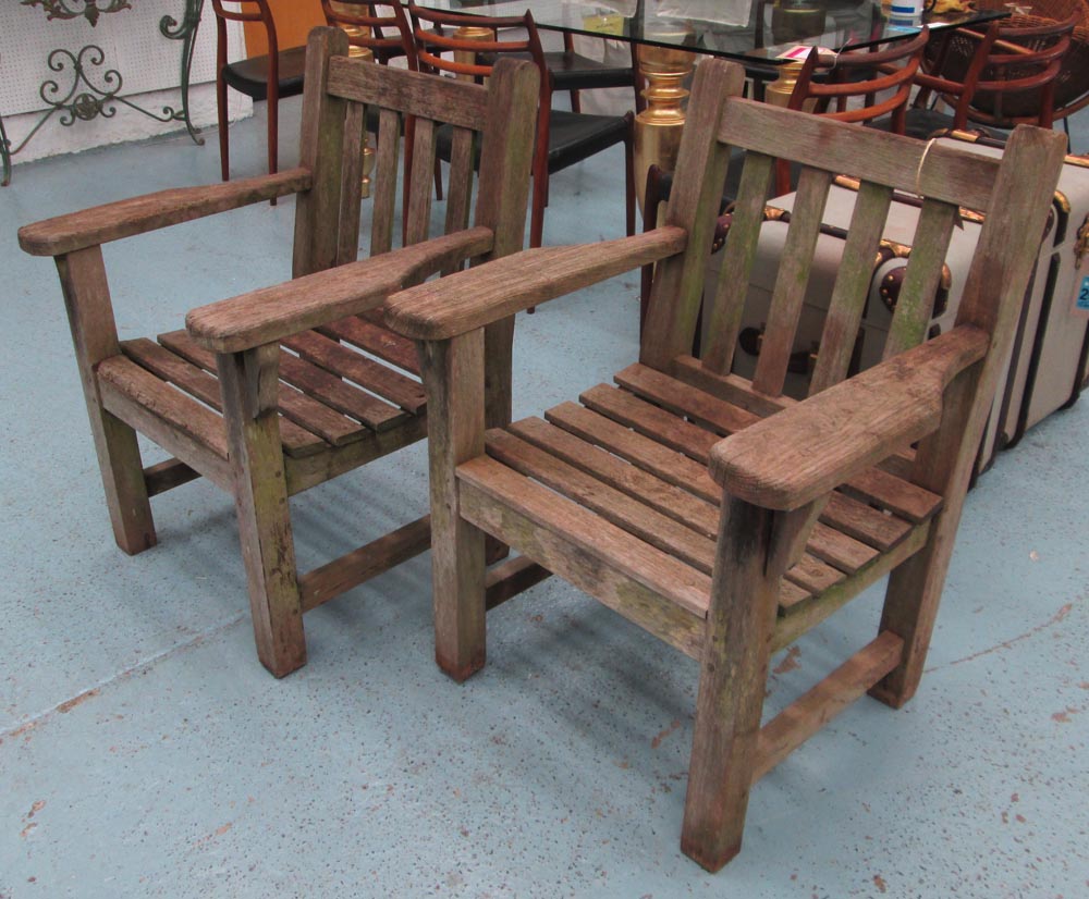 GARDEN CHAIRS, a pair, by Barlow Tyrie, weathered teak, 90cm H x 70cm W x 70cm D.