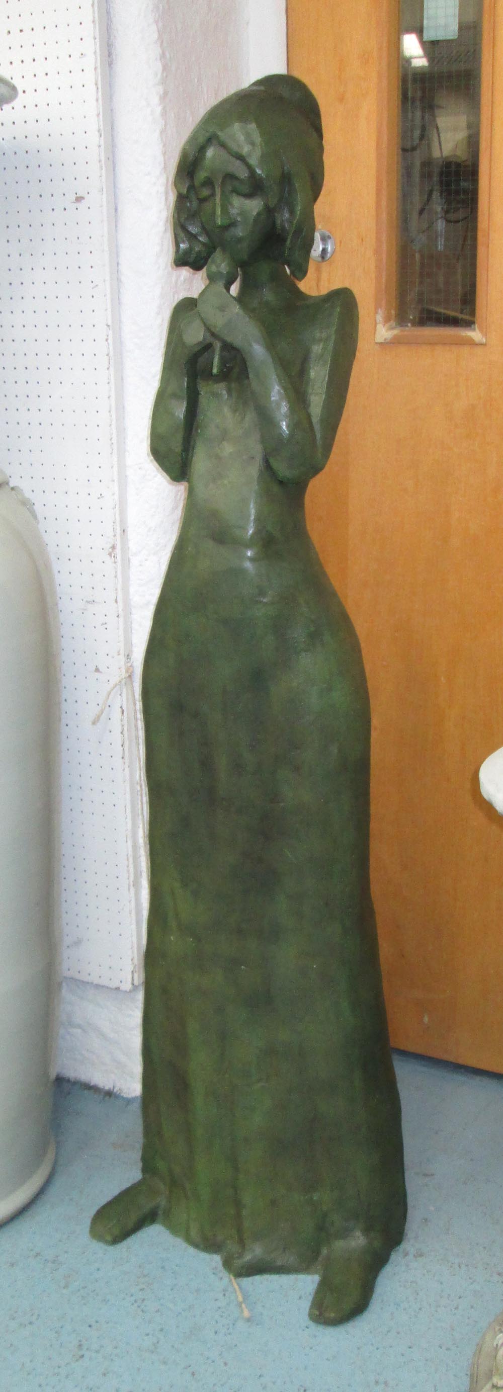 CONTEMPORARY BRONZE SCULPTURE, bronze lady with tulip, verdigris patina, 148cm H.