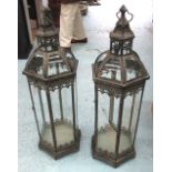 GARDEN STORM CANDLE LANTERNS, a pair, Continental style, glass lined with dome tops,