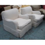 OKA ARMCHAIRS, a pair, in grey fabric with cream loose covers on circular supports, 81cm W.