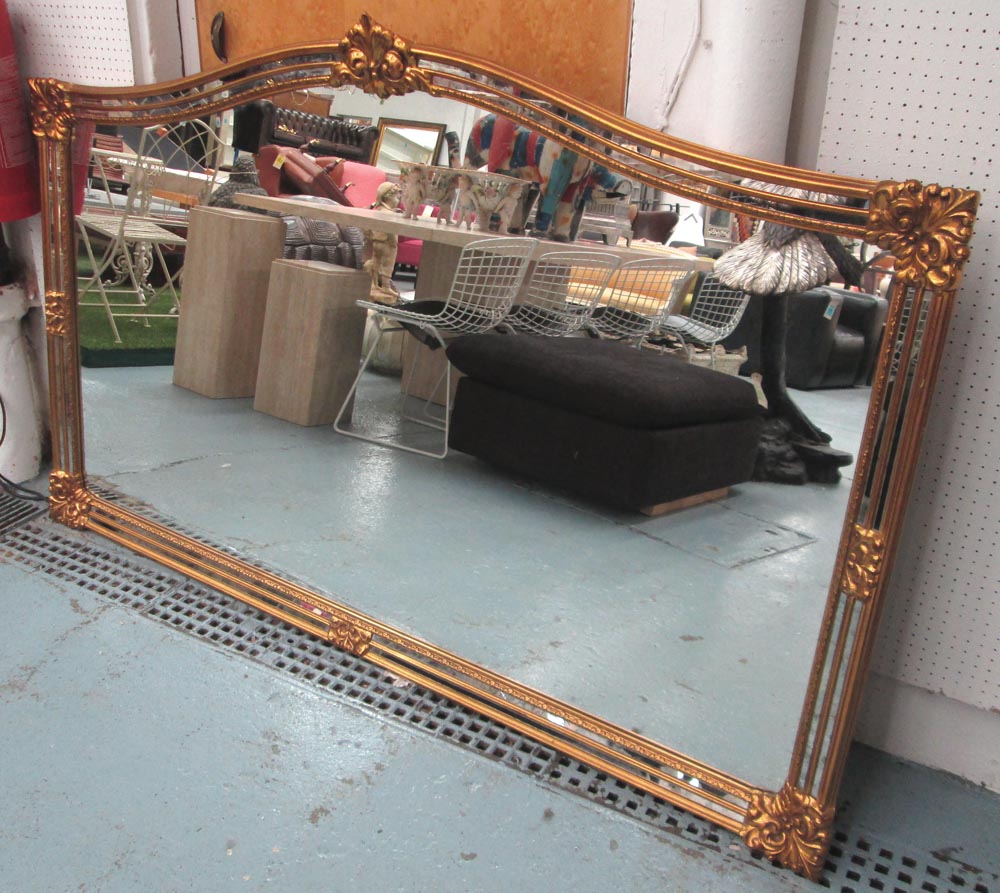 WALL MIRROR, gilt effect with a shaped top, 185cm x 113cm H.