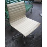 EAMES CHAIRS, a pair, ribbed cream on chromed metal supports, 'Eames ICF' label under, 52cm W.