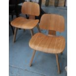 EAMES STYLE LOUNGE CHAIRS, a pair, of plywood, 50cm W.