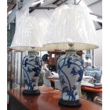 TABLE LAMPS, a pair, oriental blue and white, with shades.