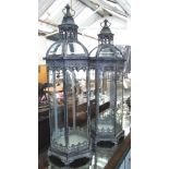 GARDEN STORM LANTERNS, a pair, 19th century style, glass lined with dome tops,