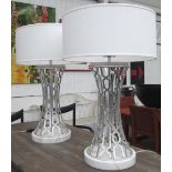 TABLE LAMPS, a pair, of silvered metal geometric form, waisted on circular white marble bases,