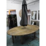 GARDEN TABLE, in teak, oval, on round supports with umbrella, 248cm x 175cm x 75cm H.