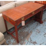 WRITING TABLE, Campaign style yewwood with brown leather top and three drawers,