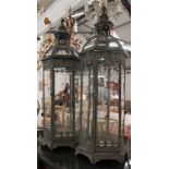 GARDEN STORM LANTERNS, a large pair, 19th century style glass lined with glass dome tops,