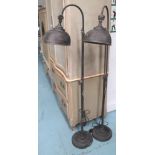 FLOOR LAMPS, a pair, Industrial style, in distressed metal finish, 37cm x 169cm.