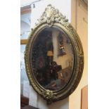 WALL MIRROR, 19th century style oval with a gilt frame and a bevelled plate, 150cm H x 106cm.