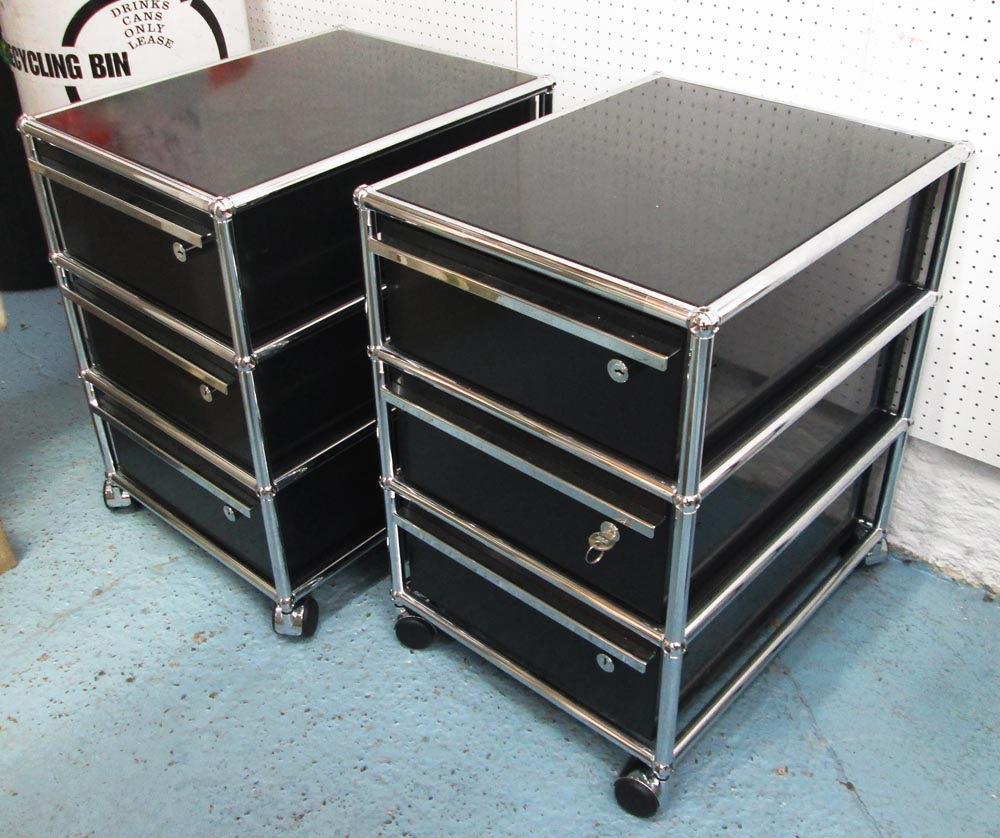 USM HALLER UNDER DESK DRAWERS, a pair, each with three drawers in black and chrome on castors,