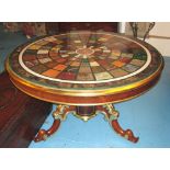 SPECIMEN MARBLE TABLE, Victorian rosewood and parcel gilt having a circular top on a triform base,