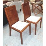 DINING CHAIRS, a set of six, wooden with cream seats, 48cm x 47cm x 96cm H.