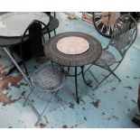 GARDEN SET, of one table and two chairs in iron and a woven top table, 62cm diam x 105cm H.