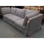 SOFA, of large proportions with loose blue and white covers, 312cm L.