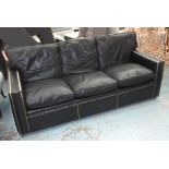 SOFA, three seater, black leather, with polished studs, 82cm H x 89cm D x 200cm L.