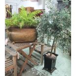 PLANTER, oval embossed brass on lion paw supports (one lacking) with a fake fern planter,