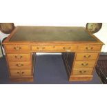 PEDESTAL DESK, early 20th century bleached mahogany with green leather top above eight drawers,