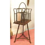 MAGAZINE RACK, Edwardian brass and oak on a triform base, 88cm H x 38cm x 24cm D.