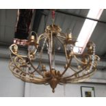 CHANDELIER, eight branch, in gilded metal, 64cm H plus chain.