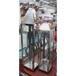 STORM LANTERNS, a set of two, large and medium chrome with glazed doors, tallest 100cm H.