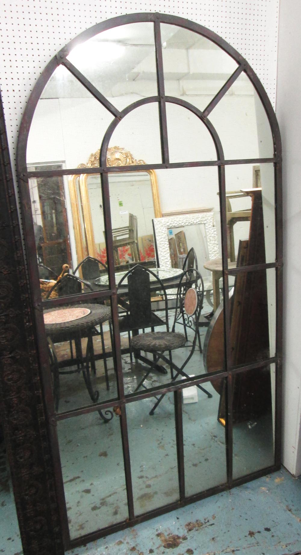 GARDEN MIRROR, of arched form with metal frame, 110cm x 210cm H.