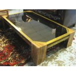 LOW TABLE, 20th century with smoked glass top, brass frame and onyx supports,