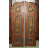 DOOR PANELS, a pair, 19th century continental polychrome gesso and pine of arched form,