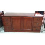 SIDEBOARD, Victorian mahogany with central two door cupboard flanked by two banks of three drawers,