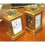 MINIATURE CARRIAGE CLOCKS, two, Swiss style, gold plated, white enamel face with Roman numerals,