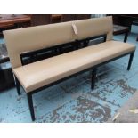CHRISTIAN LIAIGRE BENCH, in caramel leather on square ebonised supports, 180cm L.