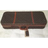 LOUIS VUITTON SMALL SUITCASE, with pocket to underside (damage to interior), 74cm x 30cm x 14cm.