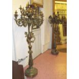 FLOOR STANDING CANDELABRA, a pair, brass each with sixteen lights, elaborately cast foliate,