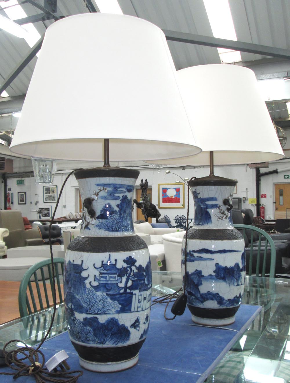 TABLE LAMPS, a pair, Chinese style, in blue and white, shades included, 79.5cm H.