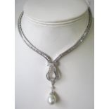 18CT GOLD AND DIAMOND NECKLACE, with pear shaped pearl pendant, approx 8ct diamonds.