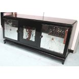 SIDE CABINET, in black lacquer with antique effect mirrored doors on square supports,