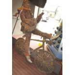 20TH CENTURY SCHOOL, 'Guitarist on a Cycle', sculpture, in mixed media,
