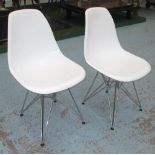 DINING CHAIRS, a set of four, in white resin on chromed metal supports, 47cm.